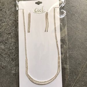 New in package costume jewelry earring and necklace set.